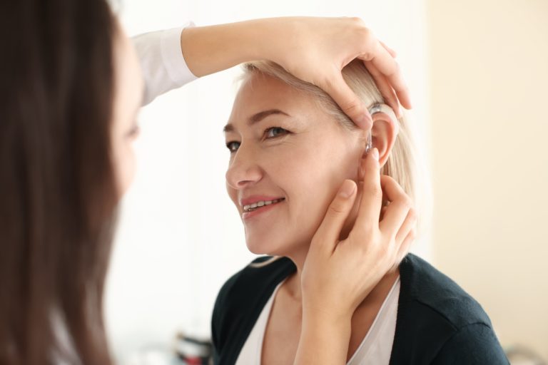 female audiologist with patient