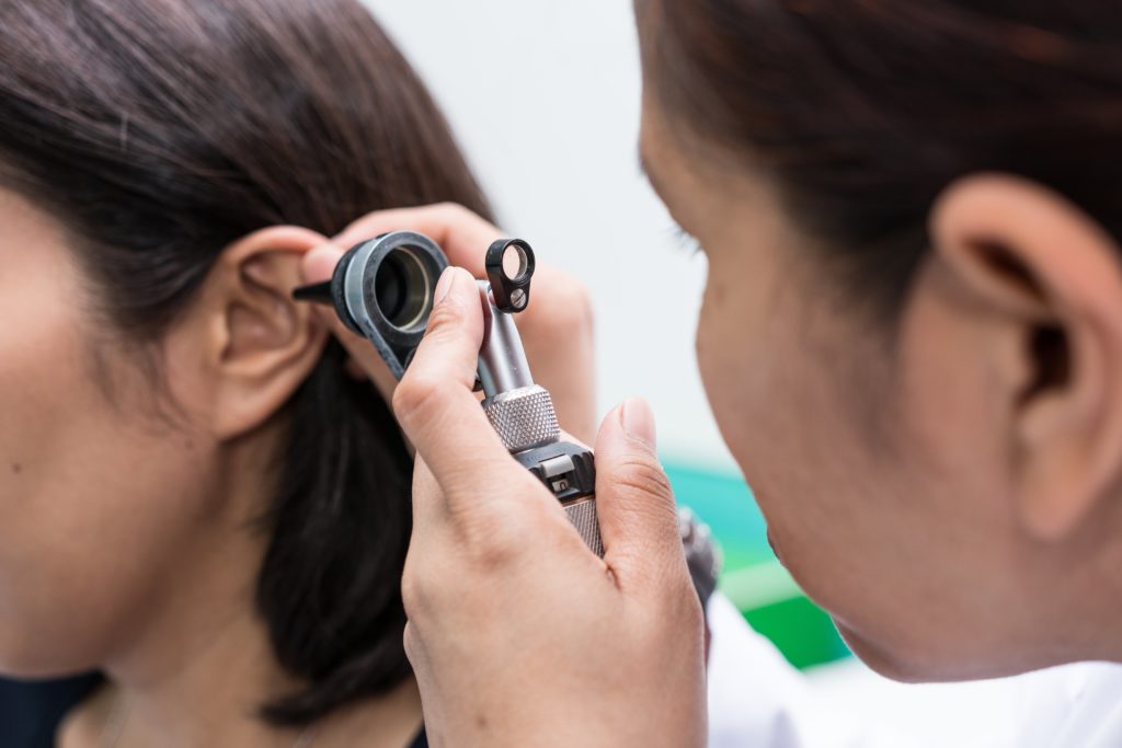 woman undergoing a hearing test
