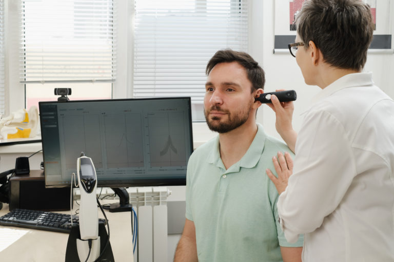man having a hearing test